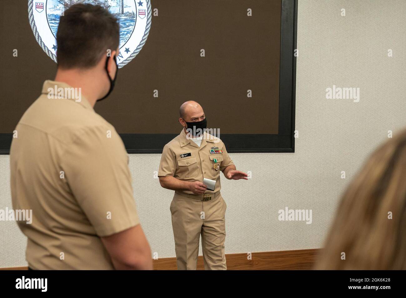 WASHINGTON, DC (Aug. 16, 2021) – Chief Navy Counselor Eduardo Rivera delivers farewell remarks to his colleagues and friends during an award ceremony held onboard Washington Navy Yard. Stock Photo