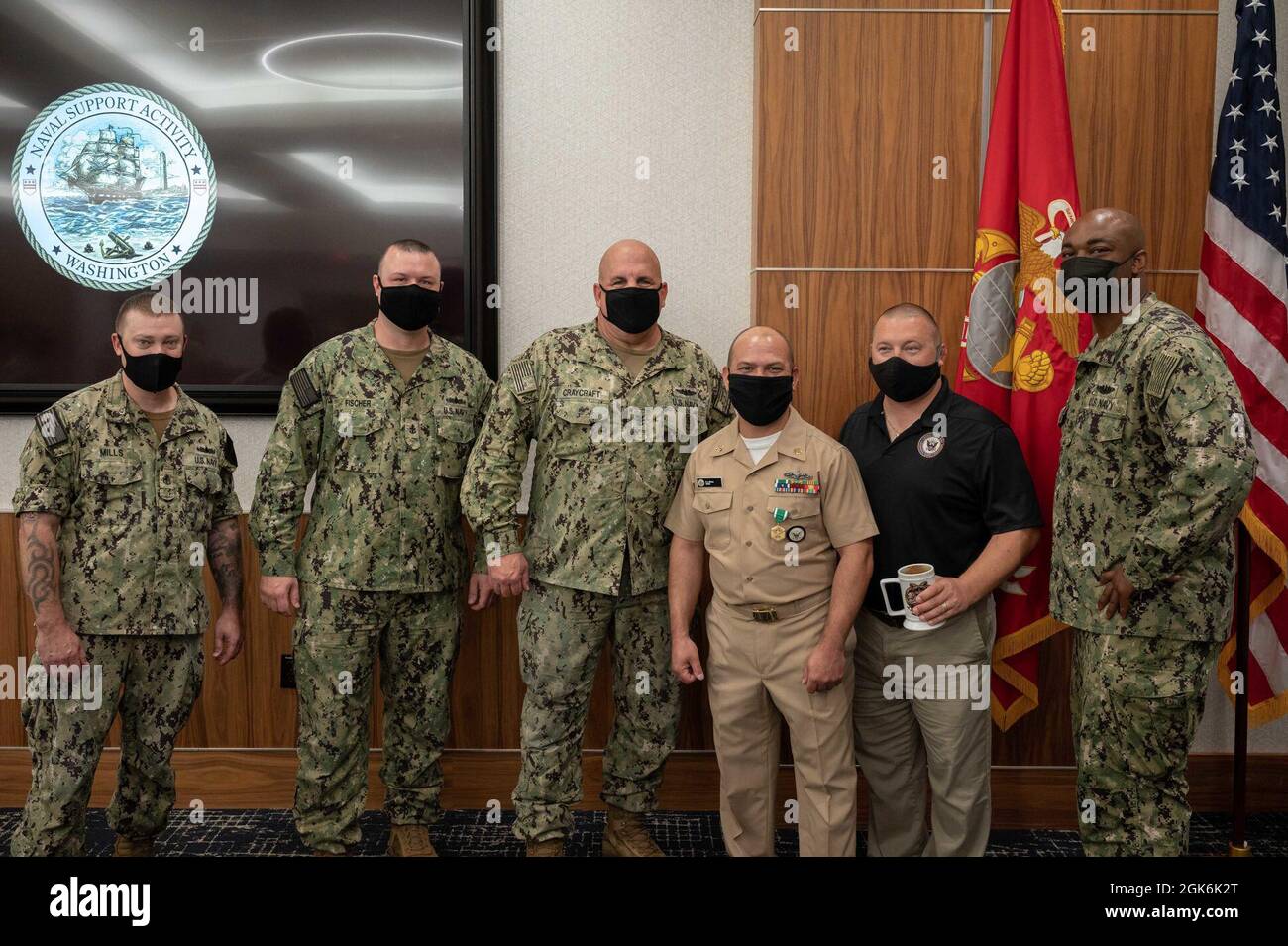 WASHINGTON, DC (Aug. 16, 2021) – Chief Navy Counselor Eduardo Rivera (center-right) poses with his colleagues following an award ceremony held onboard Washington Navy Yard. Stock Photo