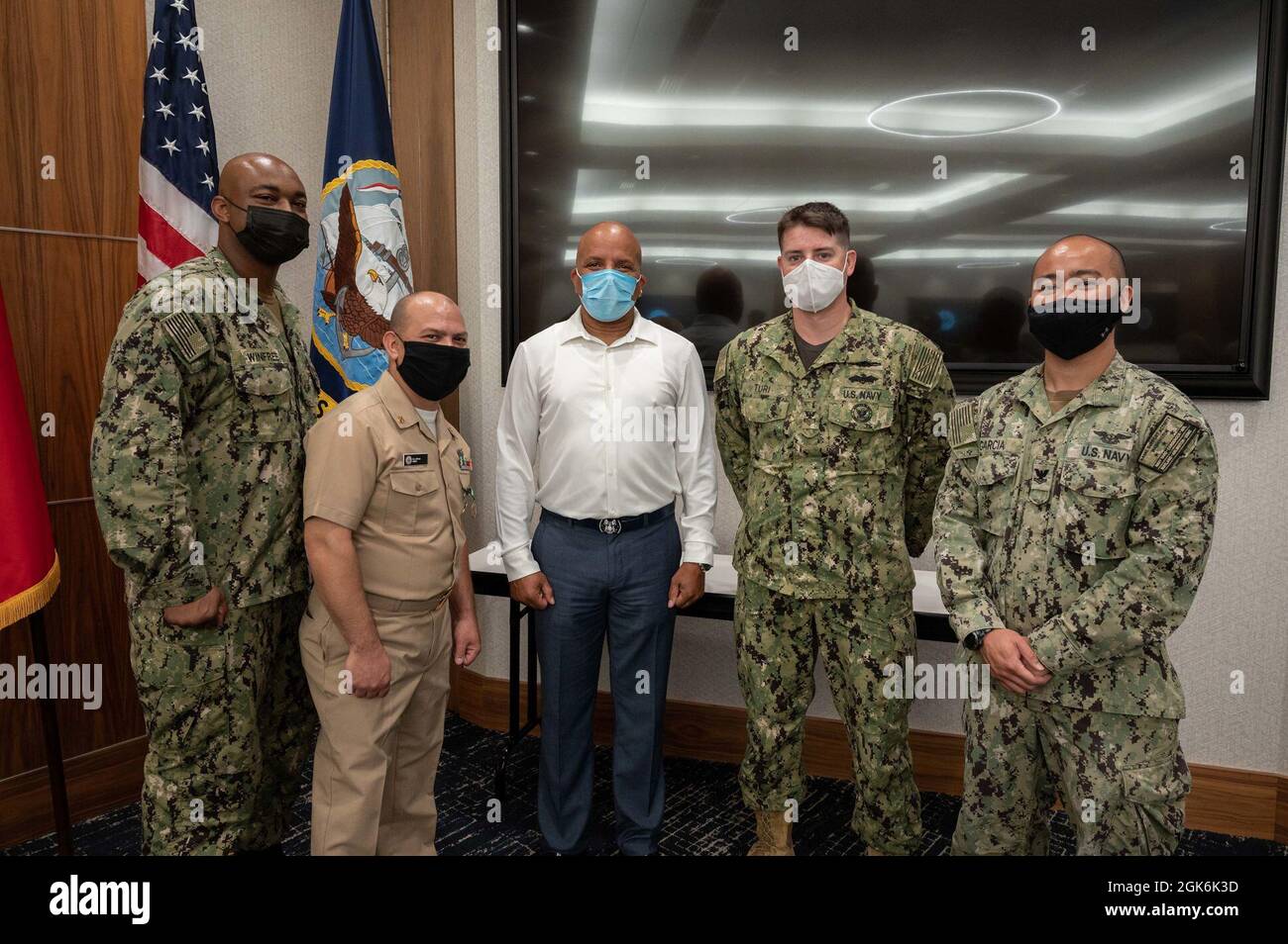 WASHINGTON, DC (Aug. 16, 2021) – Chief Navy Counselor Eduardo Rivera (center-left) poses with his colleagues following an award ceremony held onboard Washington Navy Yard. Stock Photo