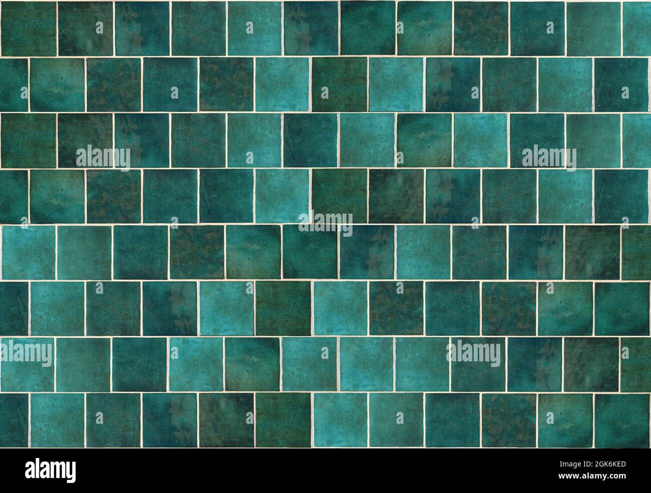 Green ceramic tile background. Old vintage ceramic tiles in green to decorate the kitchen or