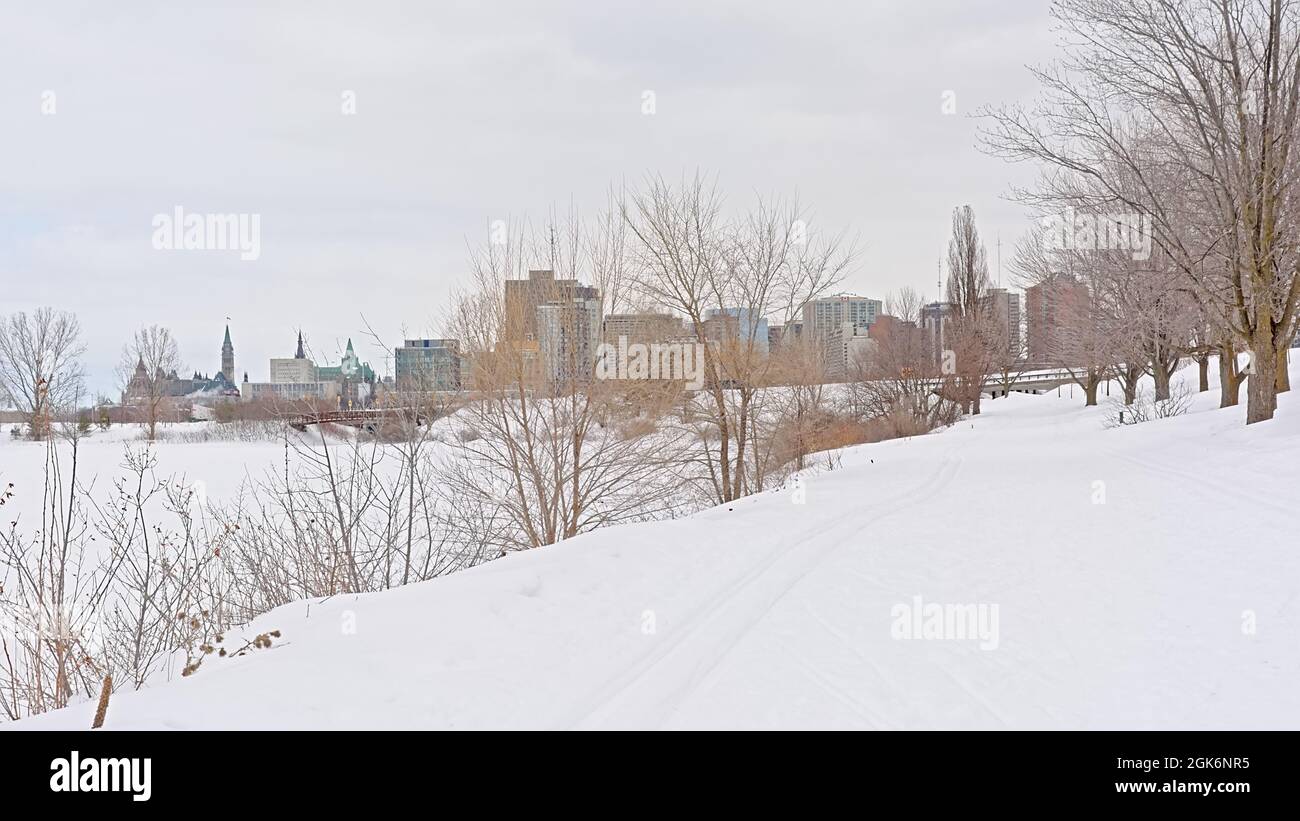 view on the city of Ottawa from the Sjam winter hiking trail along Ottawa river. Stock Photo