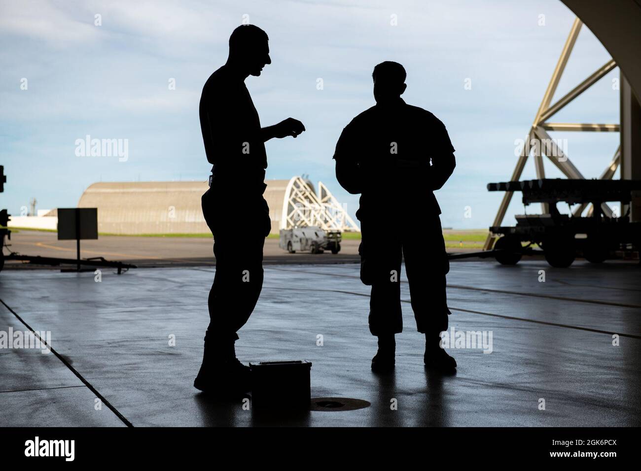 U.S. Air Force Airmen from the 44th Aircraft Maintenance Unit discuss ...