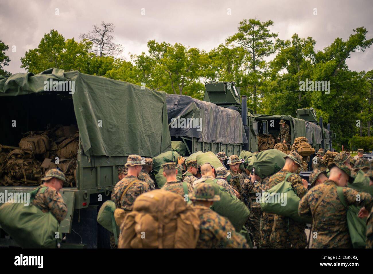 U.S. Marines from 1st Battalion, 6th Marine Regiment, 2d Marine Division, prepare to depart Camp Lejeune, N.C., Aug. 18, 2021. The Marines from 1/6 are preparing to deploy in support of Joint Task Force-Haiti for a humanitarian assistance disaster relief mission. Stock Photo