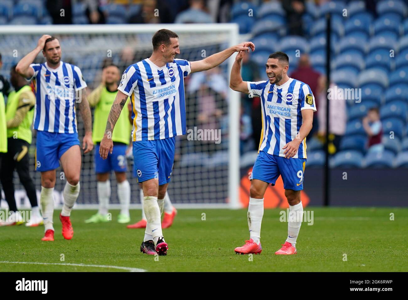 Brighton's Lewis Dunk and Neal Maupay celebrate after the final whistle Picture by Steve Flynn/AHPIX.com, Football: English Premier League match Burnl Stock Photo