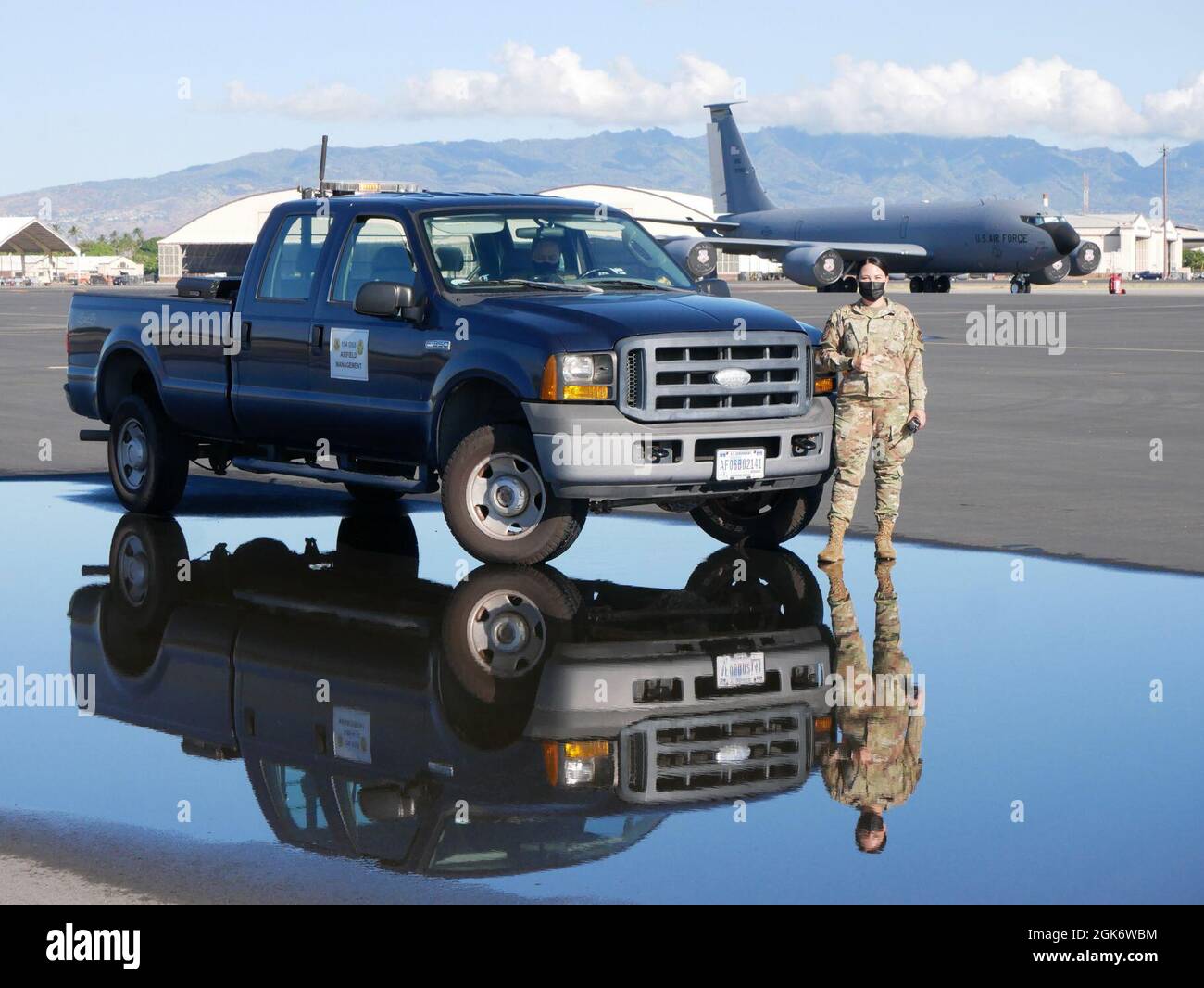 Senior Airman Veronica Mendoza, an airfield management specialist with the  Hawaii Air National Guard 154th Operations Support Squadron, poses for a  portrait August 18, 2021, at Joint Base Pearl Harbor-Hickam, Hawaii.  Professionals