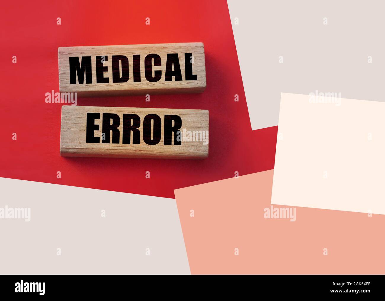 Medical error text on wooden blocks on red. Healthcare concept Stock ...