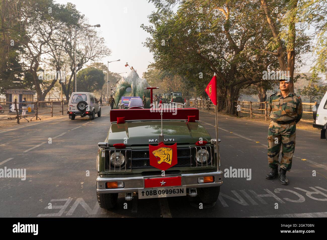 Kolkata, West Bengal, India - 23rd Januaray 2018 : Indian army man posing in front of decorated army jeep on display by Indian army. Stock Photo