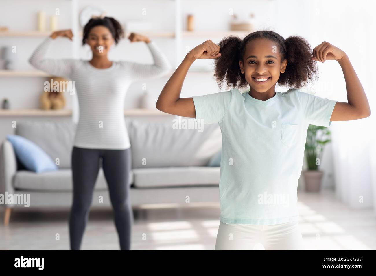 Smiling black girl showing hi-res stock photography and images - Alamy