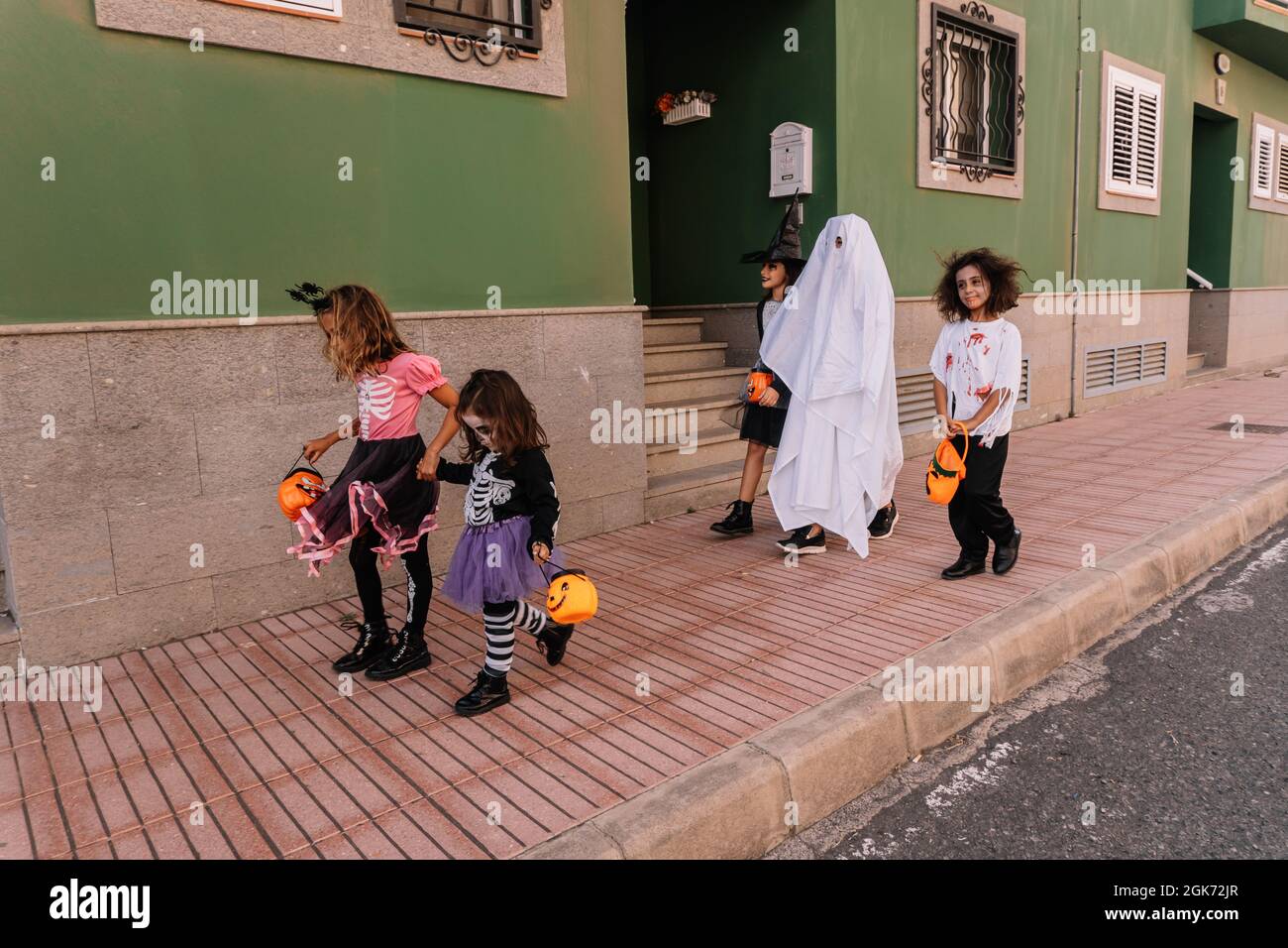Children in costumes halloween ghost hi-res stock photography and ...