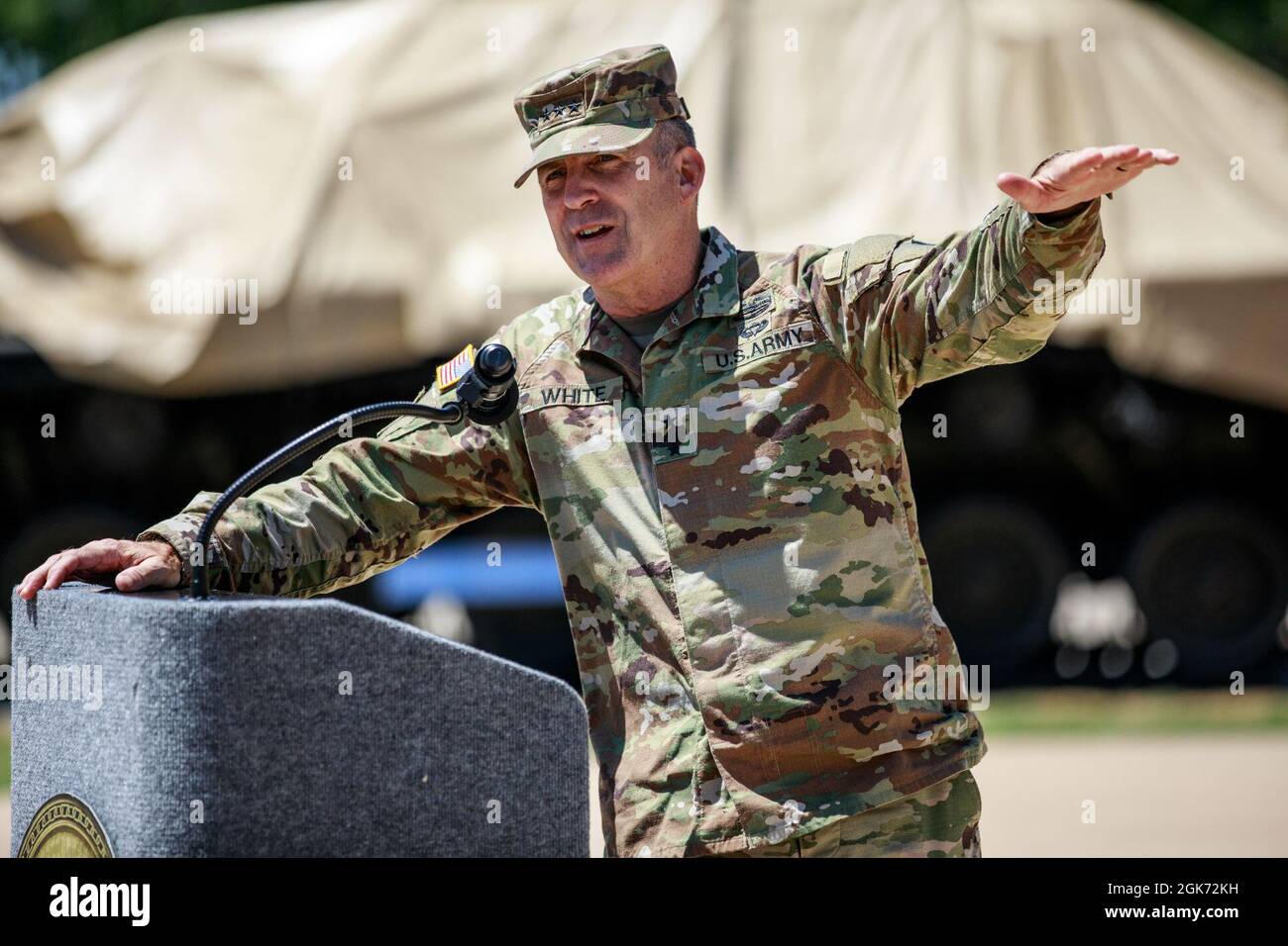 Lt. Gen. Pat White, III Corps and Fort Hood, commanding general, gives a speech for the unveiling of the M60 tank and M18 Hellcat Tank Destroyer at Fort Hood, Texas, Aug. 20, 2021.  III Armored Corps headquarters is the field proponent for armored formations, the tanks represent the history of the corps and is an remembrance of the corps’ core competency of lethality. Stock Photo