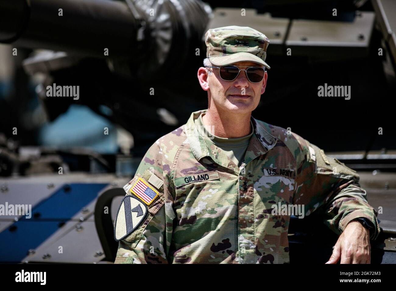 Maj. Gen. Steven Gilland, III Corps and Fort Hood, deputy commanding general, poses for a photo with an M60 Tank at Fort Hood, Texas, Aug. 20, 2021. Stock Photo