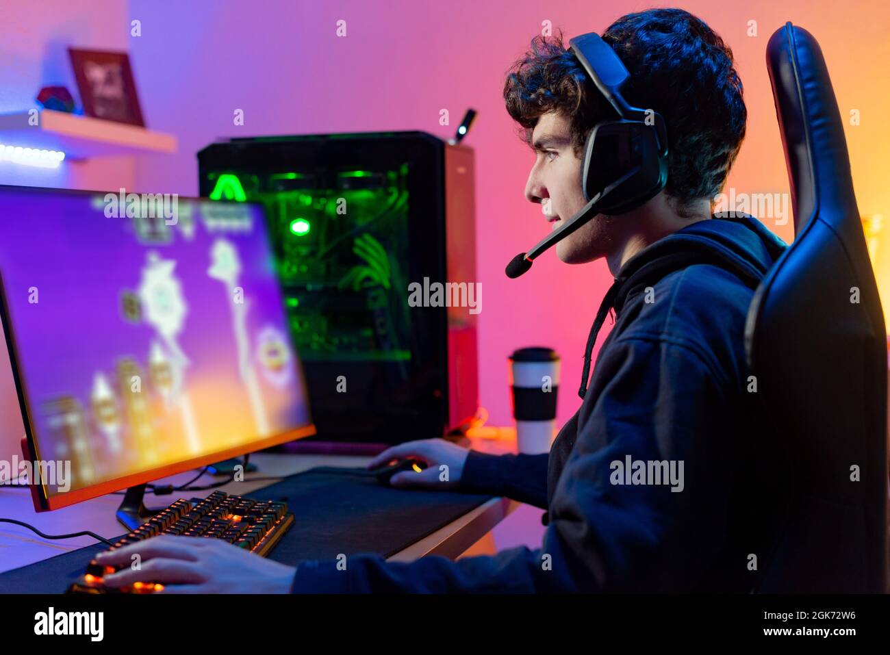 Free Photo  Player winning video games with controller and headset in  front of monitor. man using joystick and headphones, playing online games  on computer. person celebrating game win for leisure.