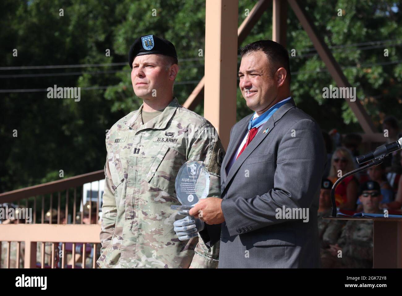 MSG Petry receiving a token of appreciation after his speech at 434th Brigade graduation on August 20th, 2021. Stock Photo