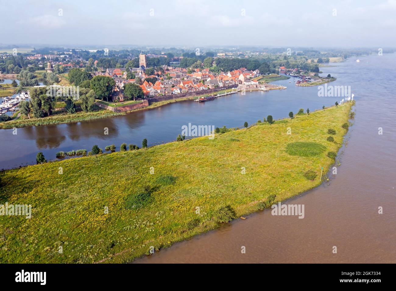Aerial from the city Woudrichem at the river Merwede in the Netherlands in a flooded landscape Stock Photo