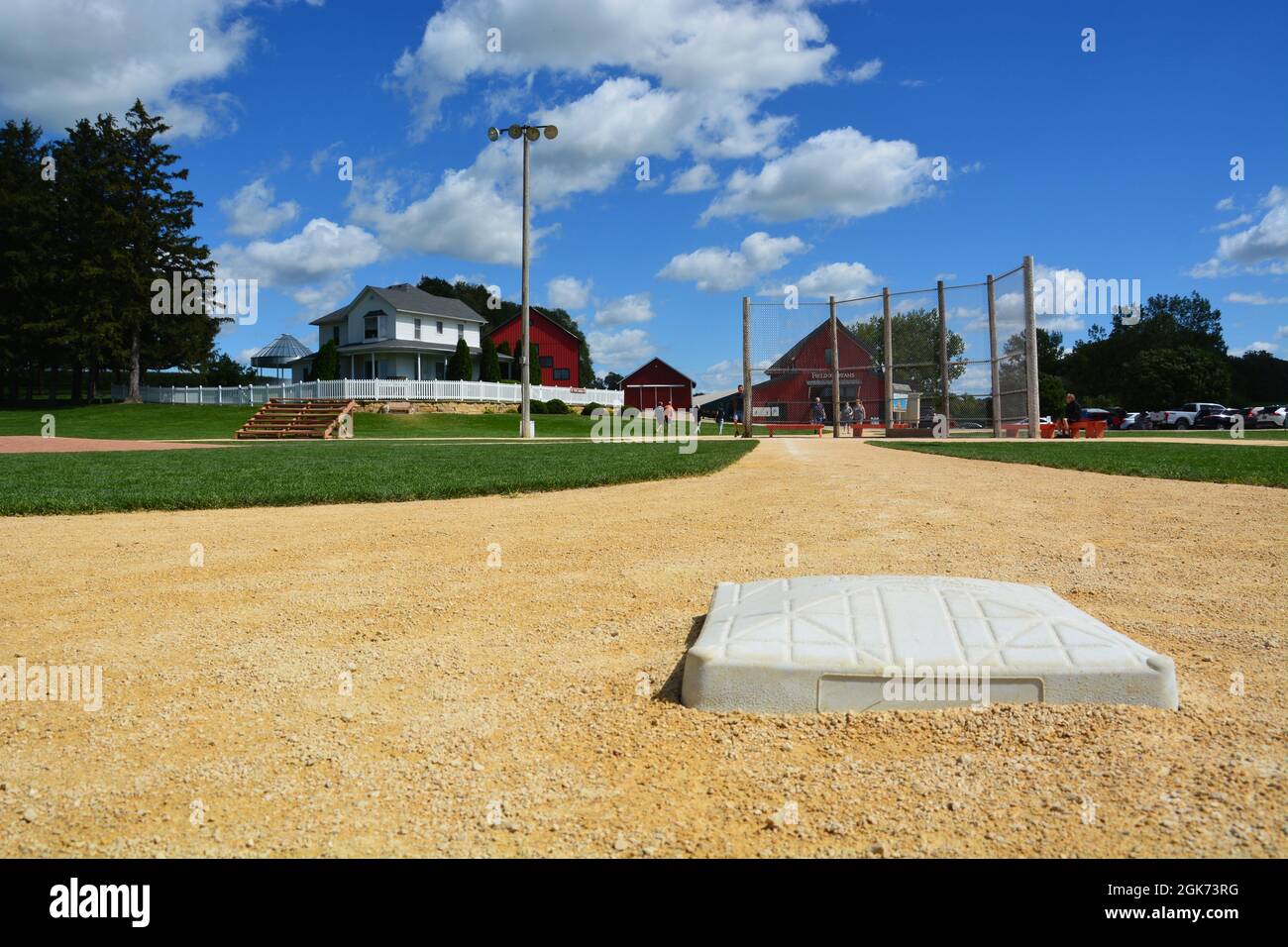 Looking down the third base line at the former movie set of The Field of Dreams in Dyersville Iowa. Focus is on the base. Stock Photo