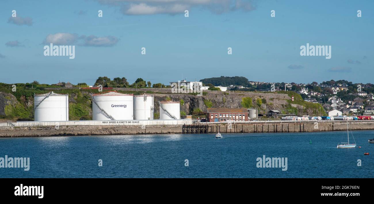 Plymouth, Devon, England, UK. 2021. Oil storage tanks and fuel tankers