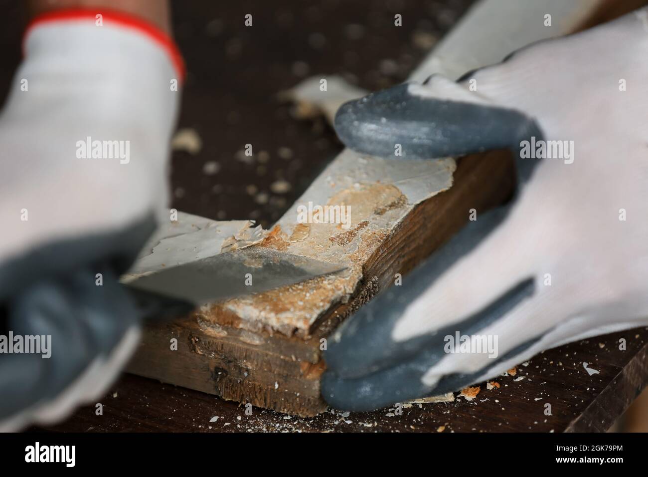 Worker removing paint from old window frame, closeup Stock Photo Alamy
