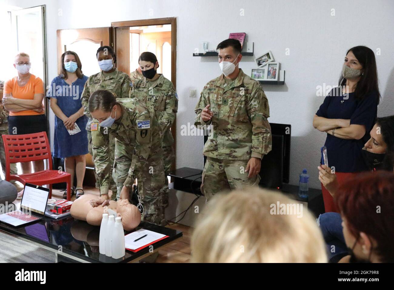 U.S. Army soldiers from Task Force Medical of KFOR Regional Command-East and other supporting units partnered with Non-Government Organization Woman 4 Woman (W4W) to lead an infant and child CPR familiarization session for local women in Gjilan, Kosovo, August 23, 2021. Stock Photo