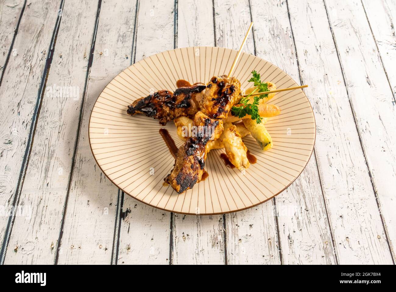 grilled pork tenderloin skewers with vegetable tempura with soy sauce