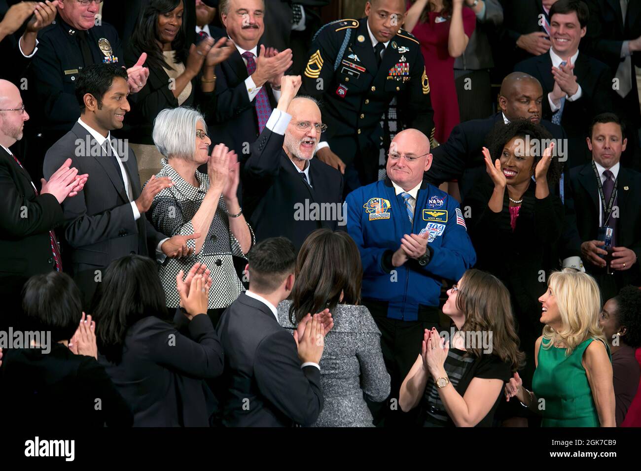 Alan Gross, who was recently released from prison in Cuba, pumps his fist in the air after being mentioned by President Barack Obama during the State of the Union address in the House Chamber at the U.S. Capitol in Washington, D.C., Jan. 20, 2015. (Official White House Photo By Chuck Kennedy) This official White House photograph is being made available only for publication by news organizations and/or for personal use printing by the subject(s) of the photograph. The photograph may not be manipulated in any way and may not be used in commercial or political materials, advertisements, emails, p Stock Photo