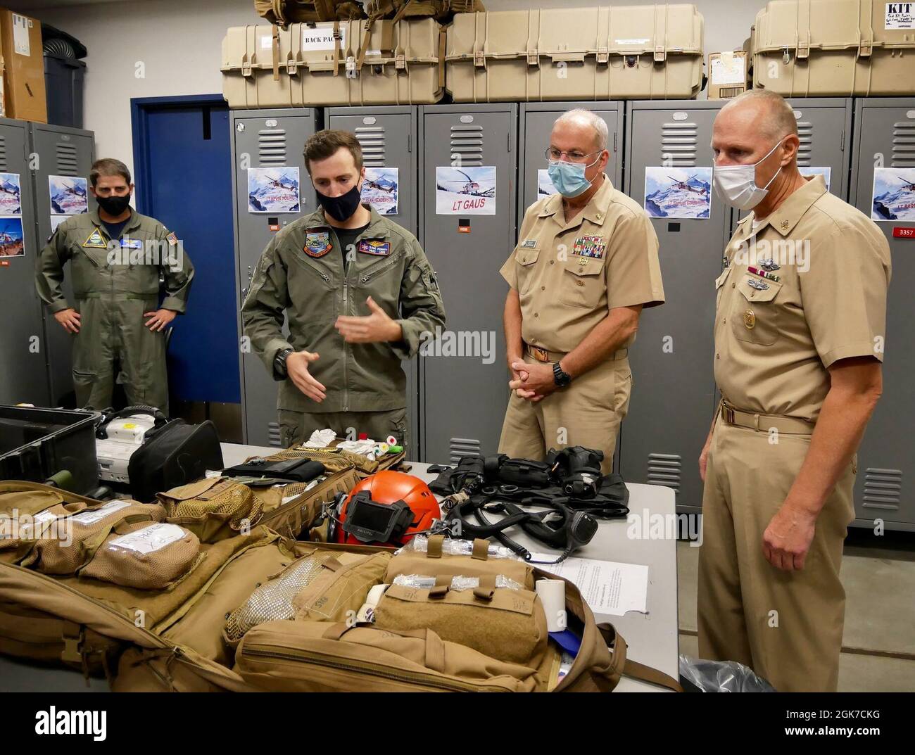 US Navy Surgeon General RADM Bruce Gillingham and Force Master Chief Michael Roberts, director of the Hospital Corps, meet with Sailors assigned to Aviation Survival Training Center (ASTC) Whidbey Island to discuss the importance of medical readiness and the critical role Navy Medicine’s people and platforms contribute to our Navy’s power projection. Stock Photo