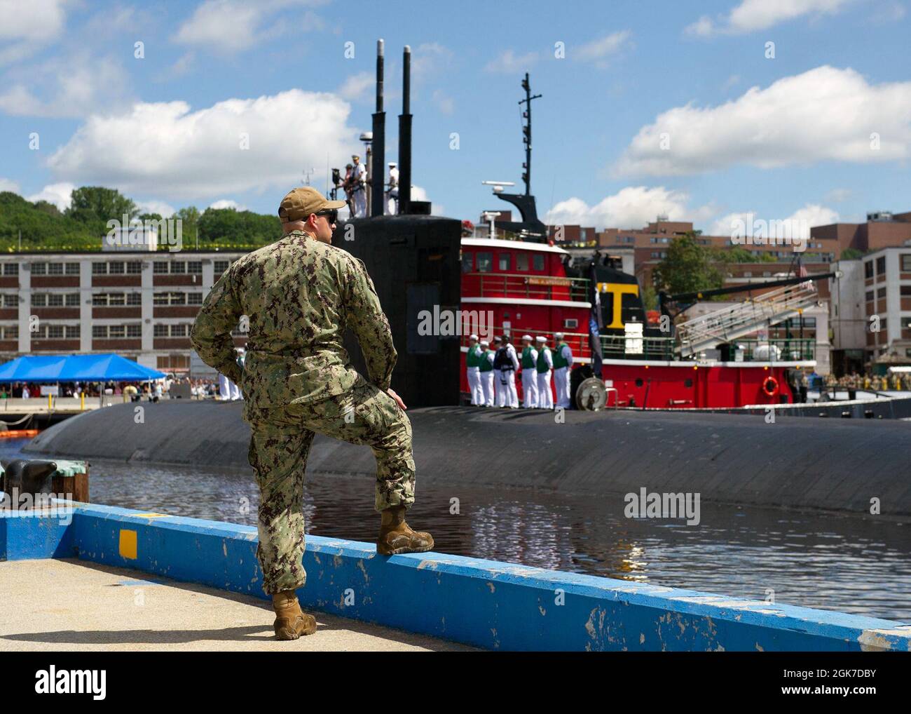 210824-N-ME396-1158 GROTON, Conn. (August 26, 2021) Electronics Technician (Navigation) 2nd Class Jesse Ciervo watches as USS San Juan (SSN 751) returns to homeport following a seven-month deployment. San Juan steamed nearly 80,000 miles during its deployment. San Juan was commissioned Aug. 6, 1988 and is the second U.S. warship named after the capital city of Puerto Rico. It is 362 feet long with a beam of 33 feet and a crew of approximately 139. Stock Photo