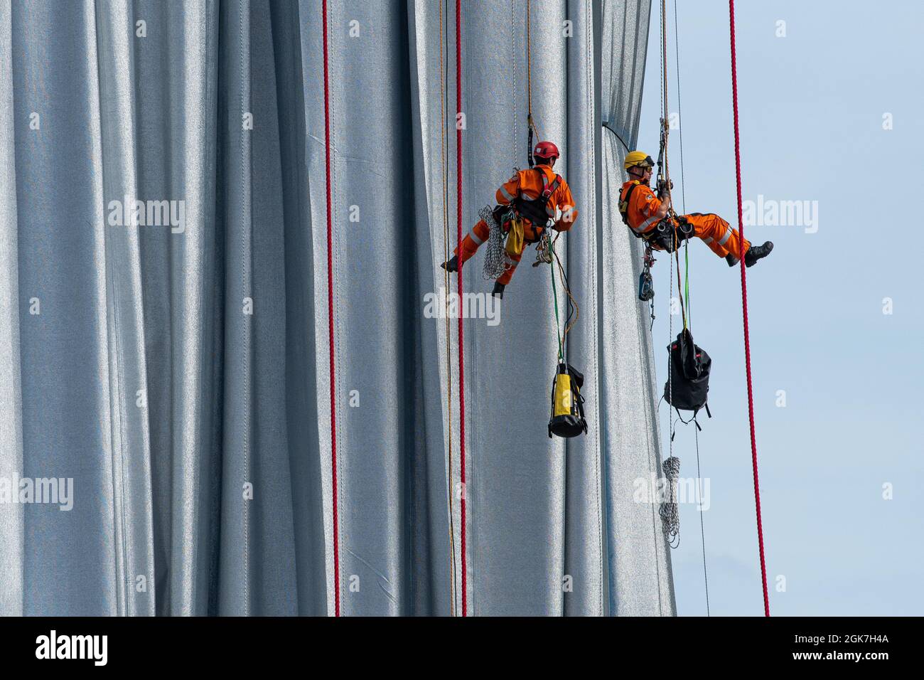 Workers install the Christo installation: Arc De Triomphe Wrapped. Stock Photo