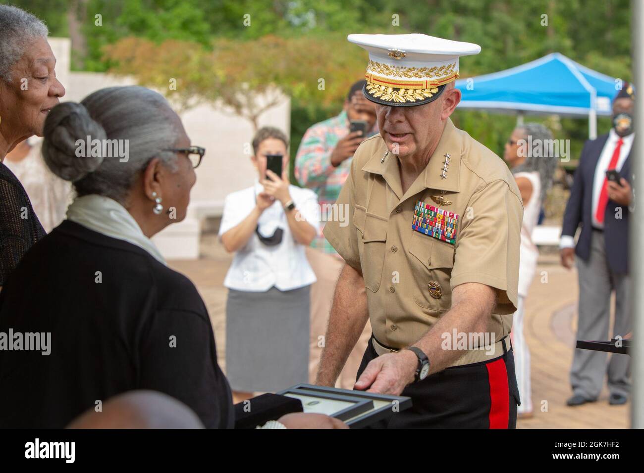 U.S. Marine Corps Commandant Gen. David H. Berger, awards the