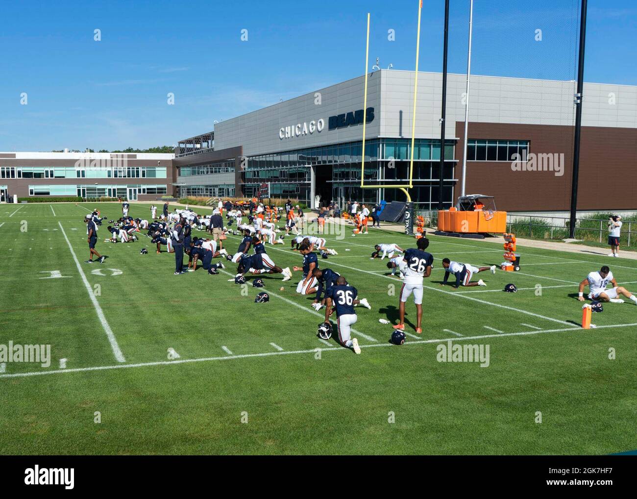 GREAT LAKES, Il. (Aug. 26, 2021) The Chicago Bears warm up for practice during the team's Military Day. Guests were invited to watch a practice and participate in a number of fun activities at Halas Hall, the Bears training facility. Stock Photo