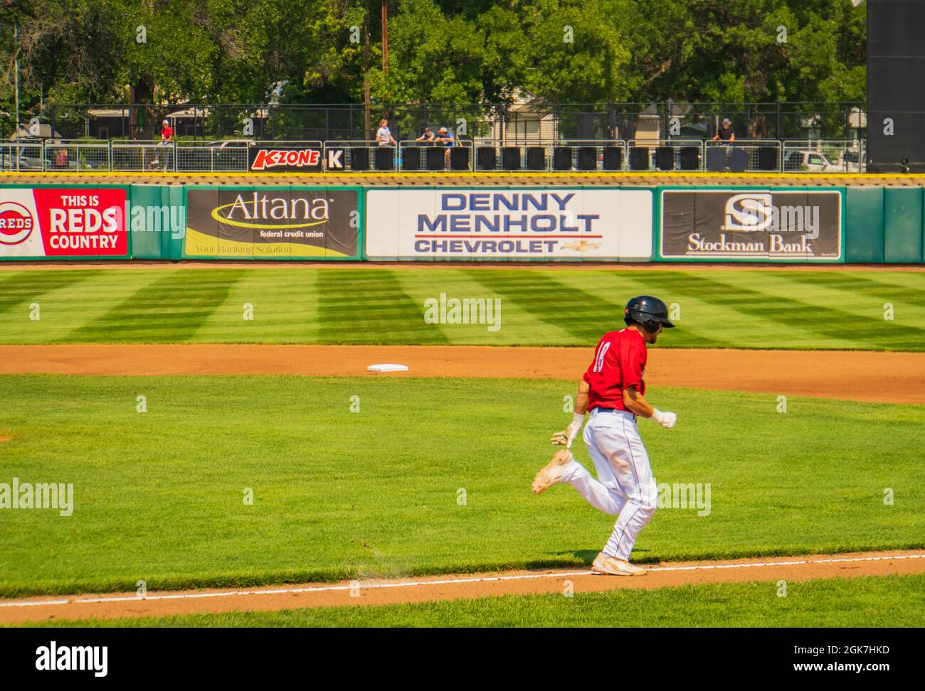 baseball player running the bases after a hit Stock Photo