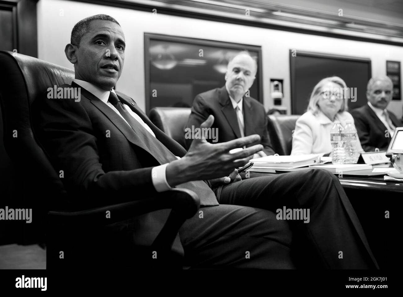 President Barack Obama and Vice President Joe Biden hold a meeting in the Situation Room of the White House, Jan. 24, 2013. Seated, from left, are: National Security Advisor Tom Donilon, Secretary of State Hillary Rodham Clinton, and Attorney General Eric Holder. (Official White House Photo by Pete Souza) This official White House photograph is being made available only for publication by news organizations and/or for personal use printing by the subject(s) of the photograph. The photograph may not be manipulated in any way and may not be used in commercial or political materials, advertisemen Stock Photo
