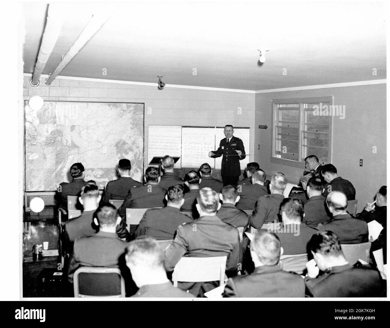An officer briefs combat communications airmen in preparation for exercise Longhaul II and field training in 1963. (Washington Air National Guard archive photo) Stock Photo