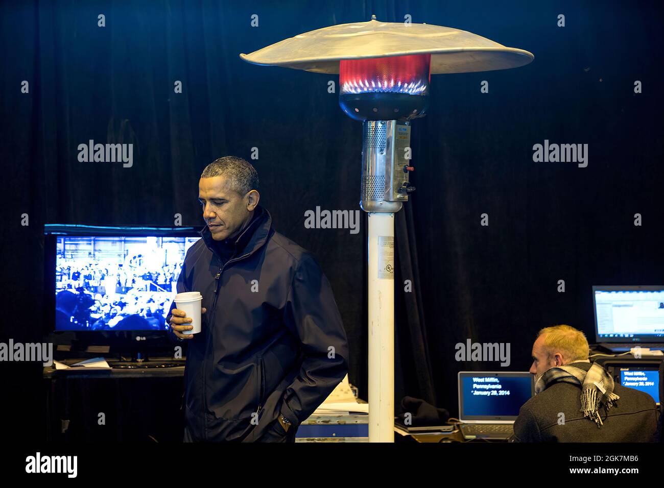 President Barack Obama drinks tea backstage prior to delivering remarks about the retirement policies highlighted in the State of the Union address, at the United States Steel Corporation Irvin Plant in West Mifflin, Penn., Jan. 29, 2014. (Official White House Photo by Pete Souza) This official White House photograph is being made available only for publication by news organizations and/or for personal use printing by the subject(s) of the photograph. The photograph may not be manipulated in any way and may not be used in commercial or political materials, advertisements, emails, products, pro Stock Photo