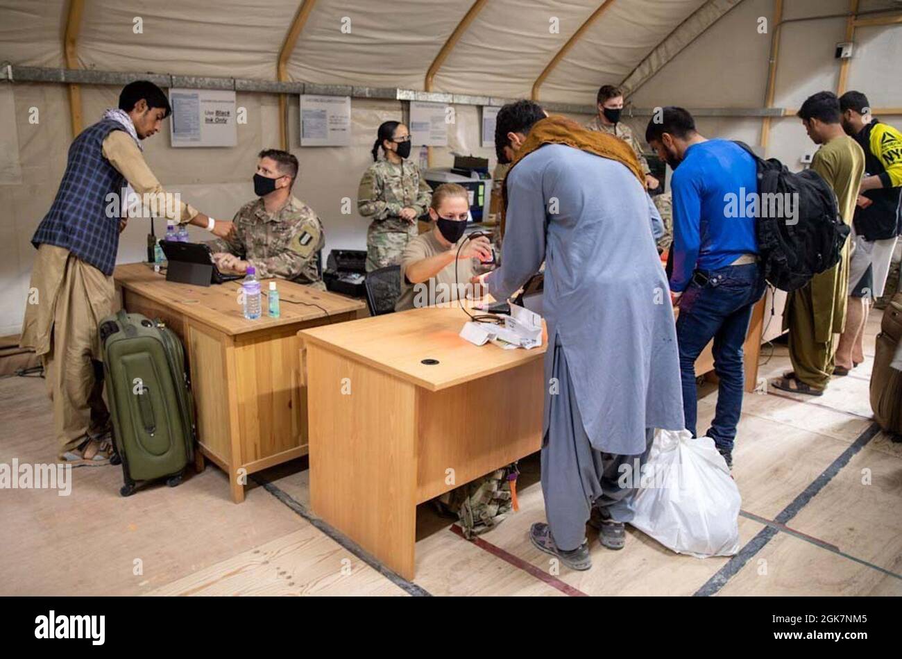 U.S. Army Central Soldiers Welcome And Assist Afghan Evacuees As They ...