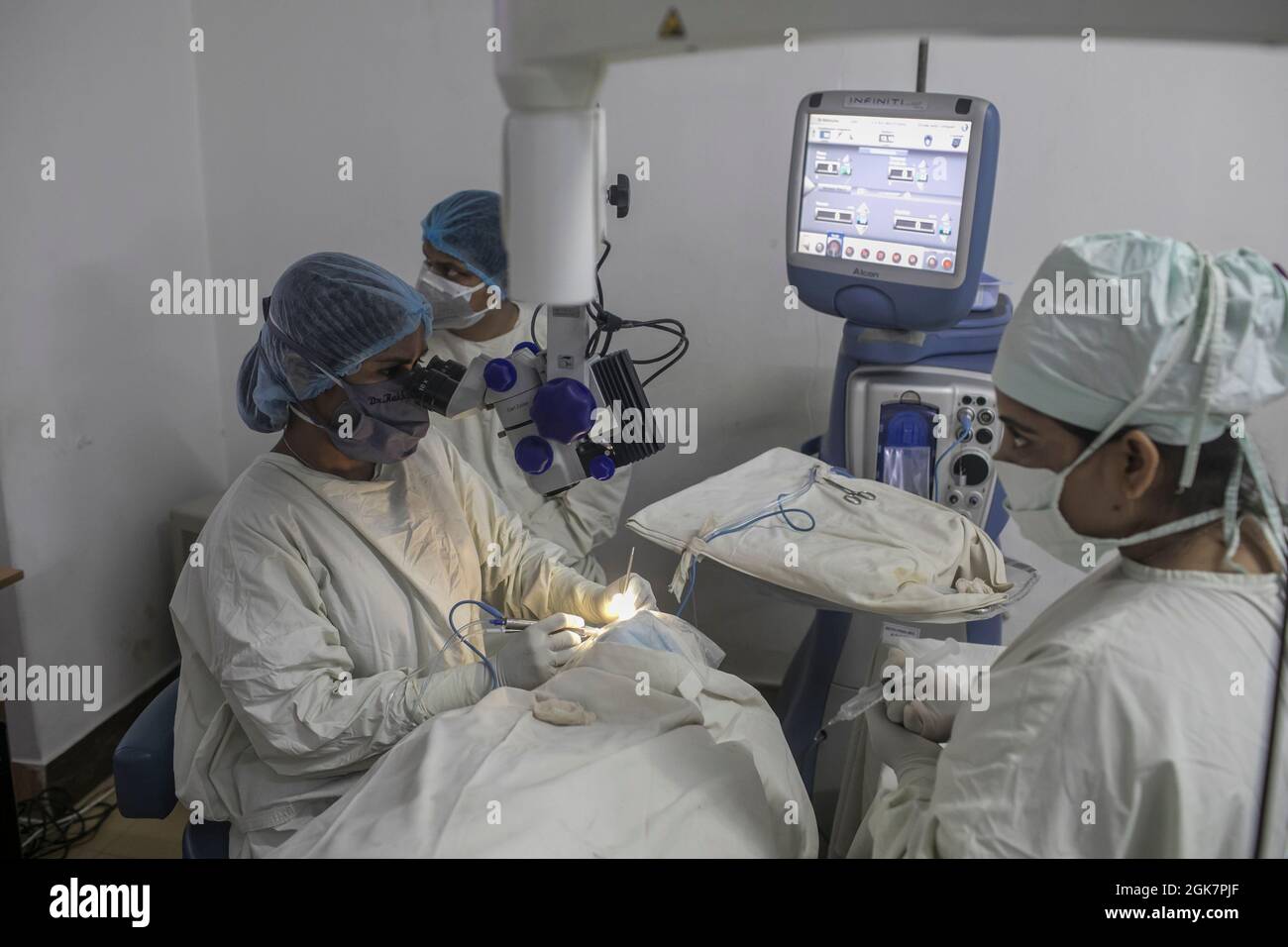 Dr. Rokhsanda Rehnuma performs a surgical technique to remove a ...