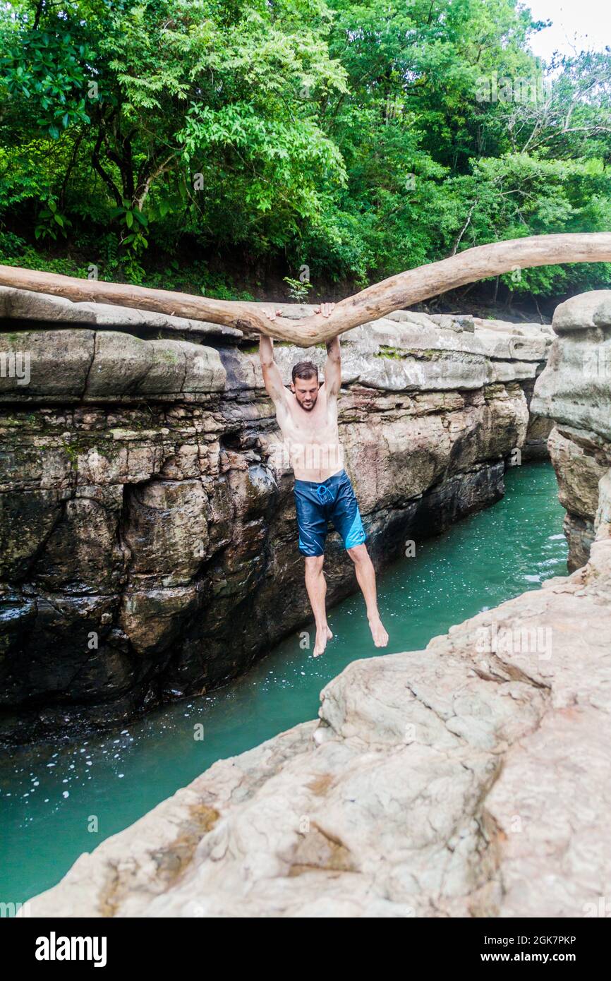 GUALACA, PANAMA - MAY 23, 2016: Tourist enjoys Los Cangilones de Gualaca - mini canyon in Panama Stock Photo