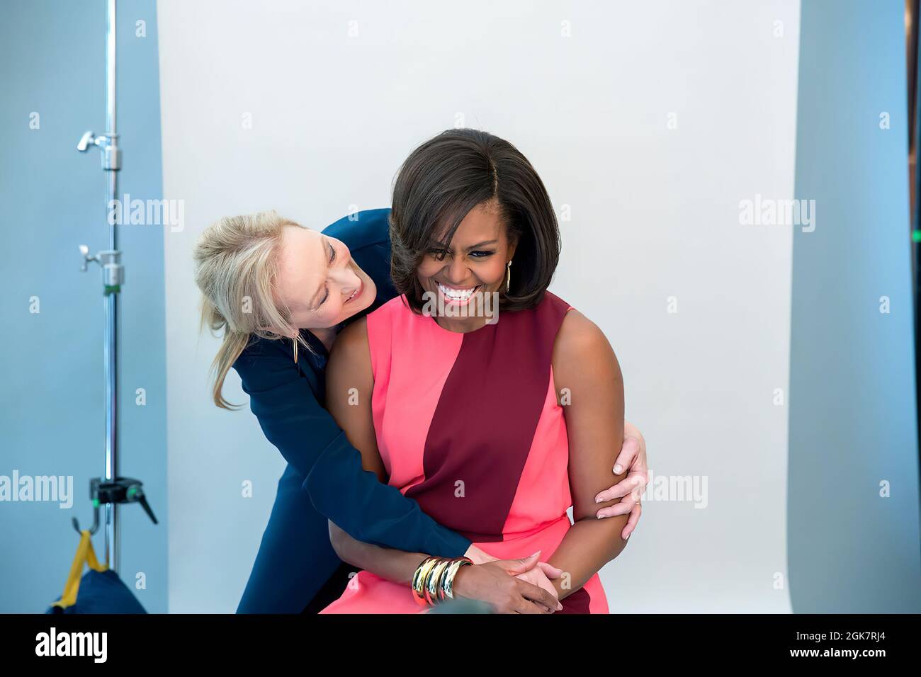 First Lady Michelle Obama and Meryl Streep participate in a photo shoot for MORE magazine in the Blue Room of the White House, Feb. 24, 2015. (Official White House Photo by Amanda Lucidon) This official White House photograph is being made available only for publication by news organizations and/or for personal use printing by the subject(s) of the photograph. The photograph may not be manipulated in any way and may not be used in commercial or political materials, advertisements, emails, products, promotions that in any way suggests approval or endorsement of the President, the First Family, Stock Photo