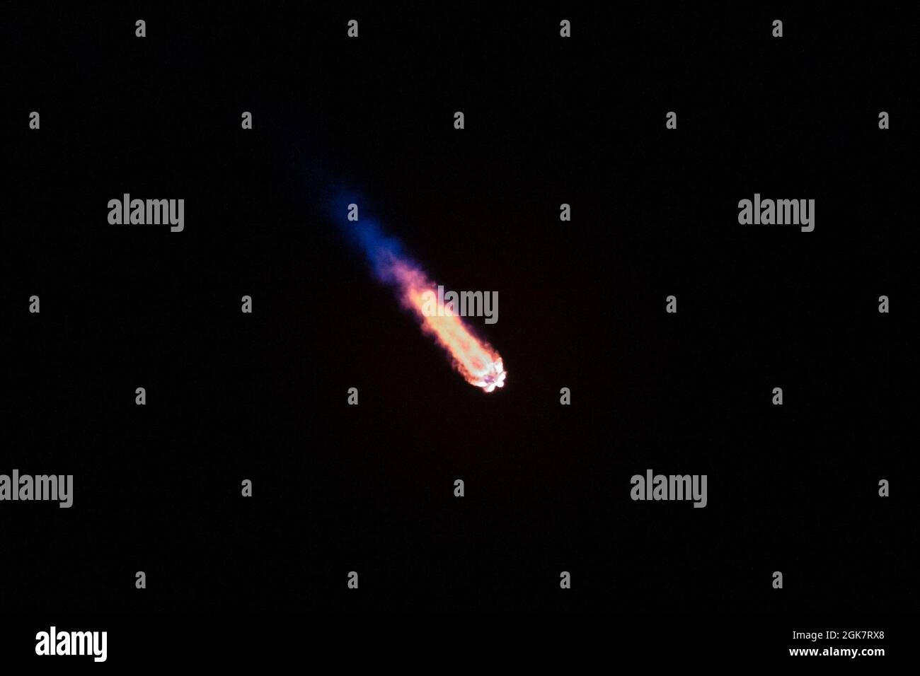 A SpaceX Falcon 9 rocket carrying NASA’s CRS-23 payload launches from Launch Complex 39A at Kennedy Space Center, Fla., August 29, 2021. The Dragon spacecraft carried approximately 4,800 pounds of crucial supplies and equipment, as well as more than a dozen payloads to the International Space Station. Stock Photo