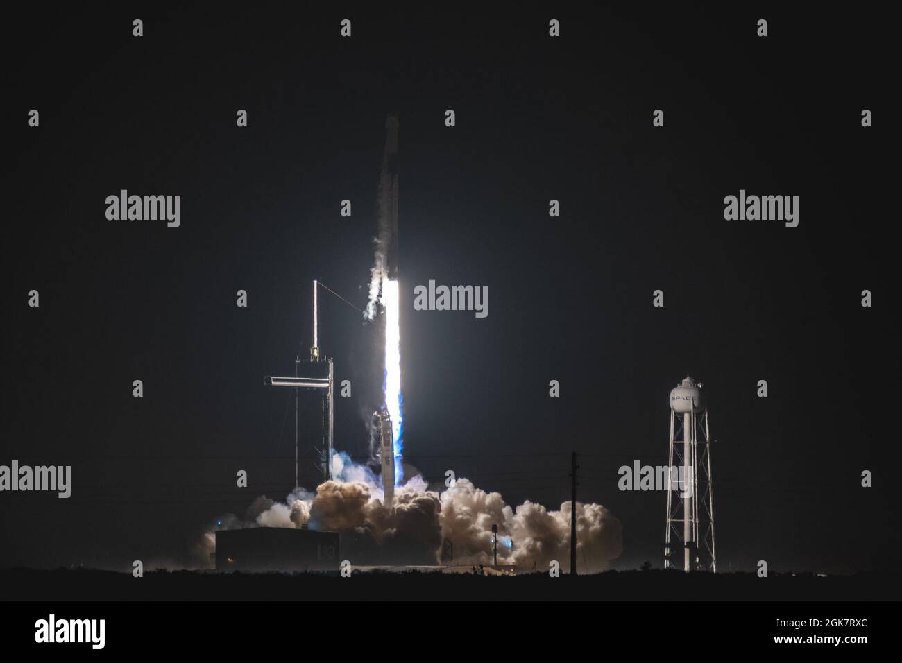 A SpaceX Falcon 9 rocket carrying NASA’s CRS-23 payload launches from Launch Complex 39A at Kennedy Space Center, Fla., August 29, 2021. The Dragon spacecraft carried approximately 4,800 pounds of crucial supplies and equipment, as well as more than a dozen payloads to the International Space Station. Stock Photo