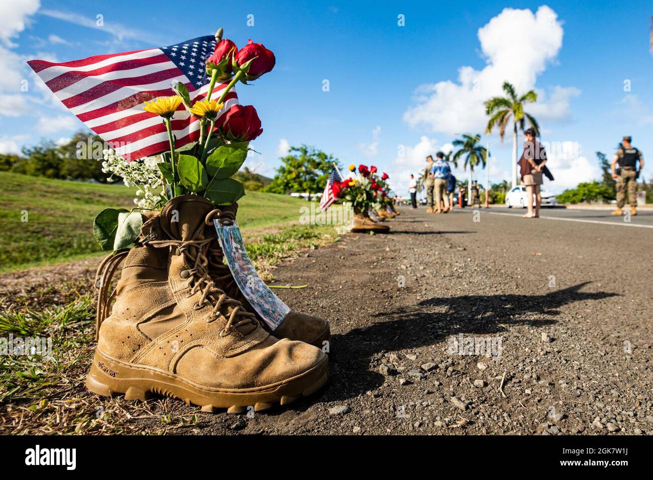 A pair of boots is displayed as part of a memorial aboard Marine Corps Base Hawaii, Aug. 29, 2021, in remembrance of the 13 service members recently killed in Afghanistan. The memorial, comprised of community donations, was displayed at the entrance of MCBH. Stock Photo
