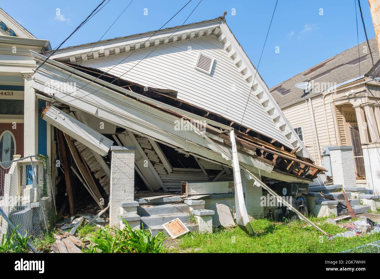 NEW ORLEANS, LA, USA - SEPTEMBER 11, 2021: Front of collapsed house following Hurricane Ida in Uptown Neighborhood Stock Photo