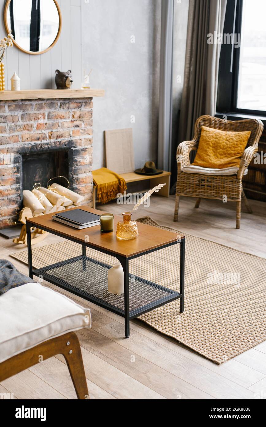 Cozy interior of the living room rattan chair and Fireplace