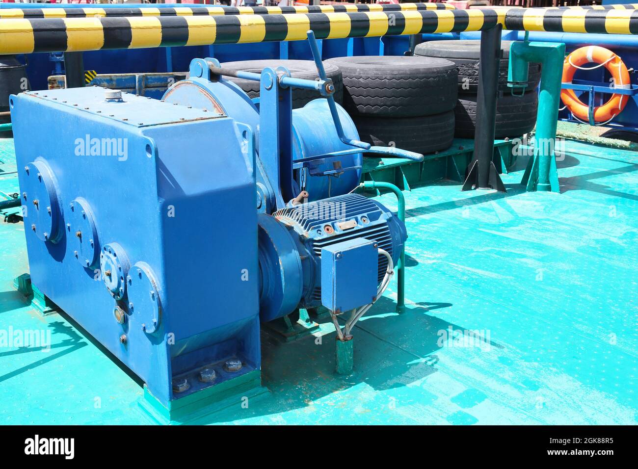 Anchor windlass on ship deck in sunny day Stock Photo Alamy