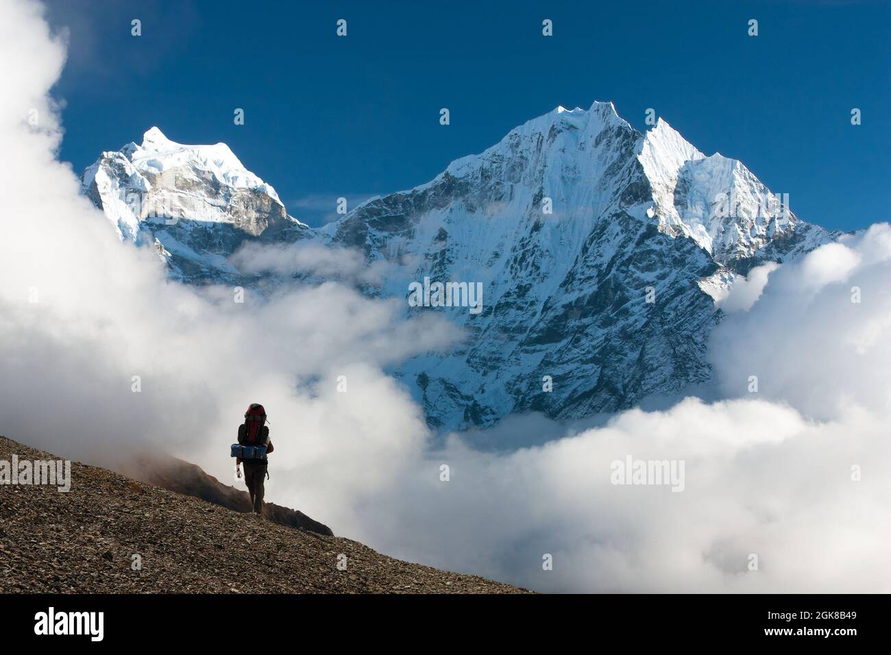 Kangtega and Thamserku with tourist - beautiful mounts above the Namche Bazar on the way to Everest Base Camp - Nepal Stock Photo
