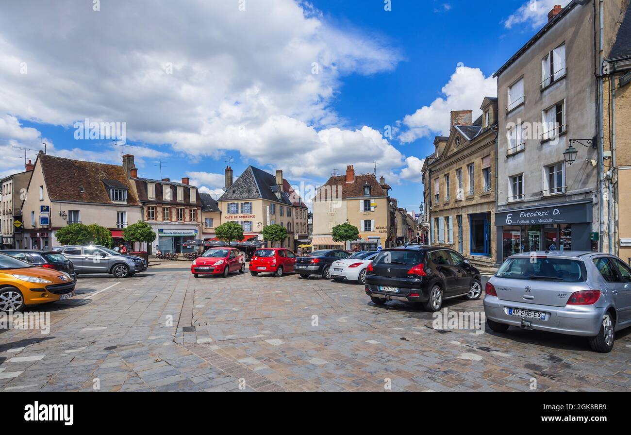 Cars parked in the Place du Marché, La Chatre, Indre (36), France. Stock Photo