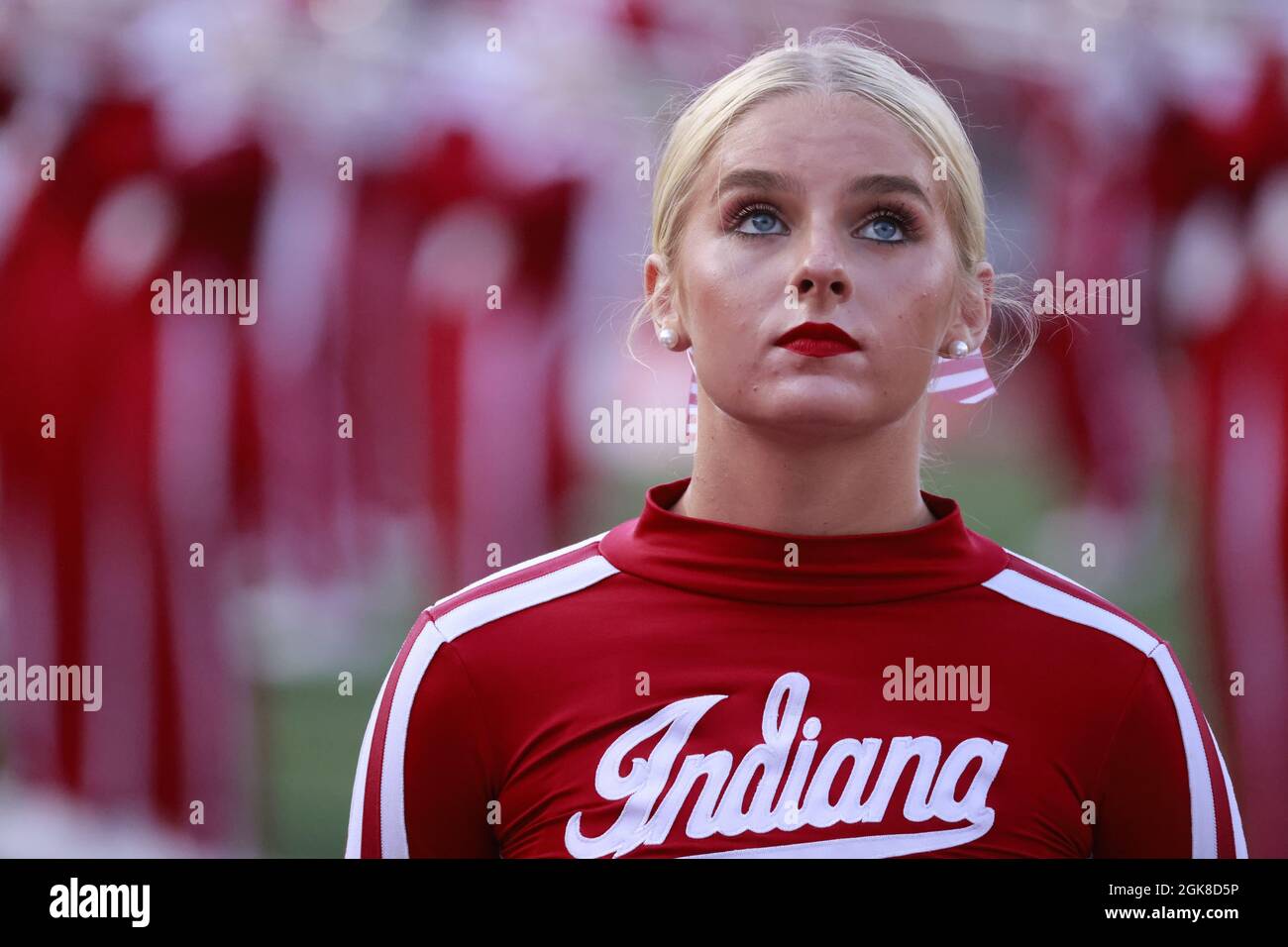 BLOOMINGTON, UNITED STATES - 2021/09/11: Indiana University cheerleaders lead a cheer before IU plays against Idaho during an NCAA football game on September 11, 2021 at Memorial Stadium in Bloomington, Ind. The Hoosiers beat the Vandals 56-14. Stock Photo