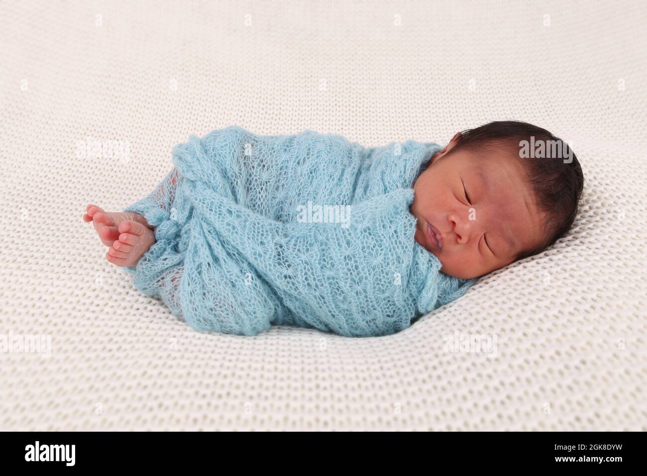 child with parents of Philippines ethnicity baby born in the UK, new born baby boy Stock Photo