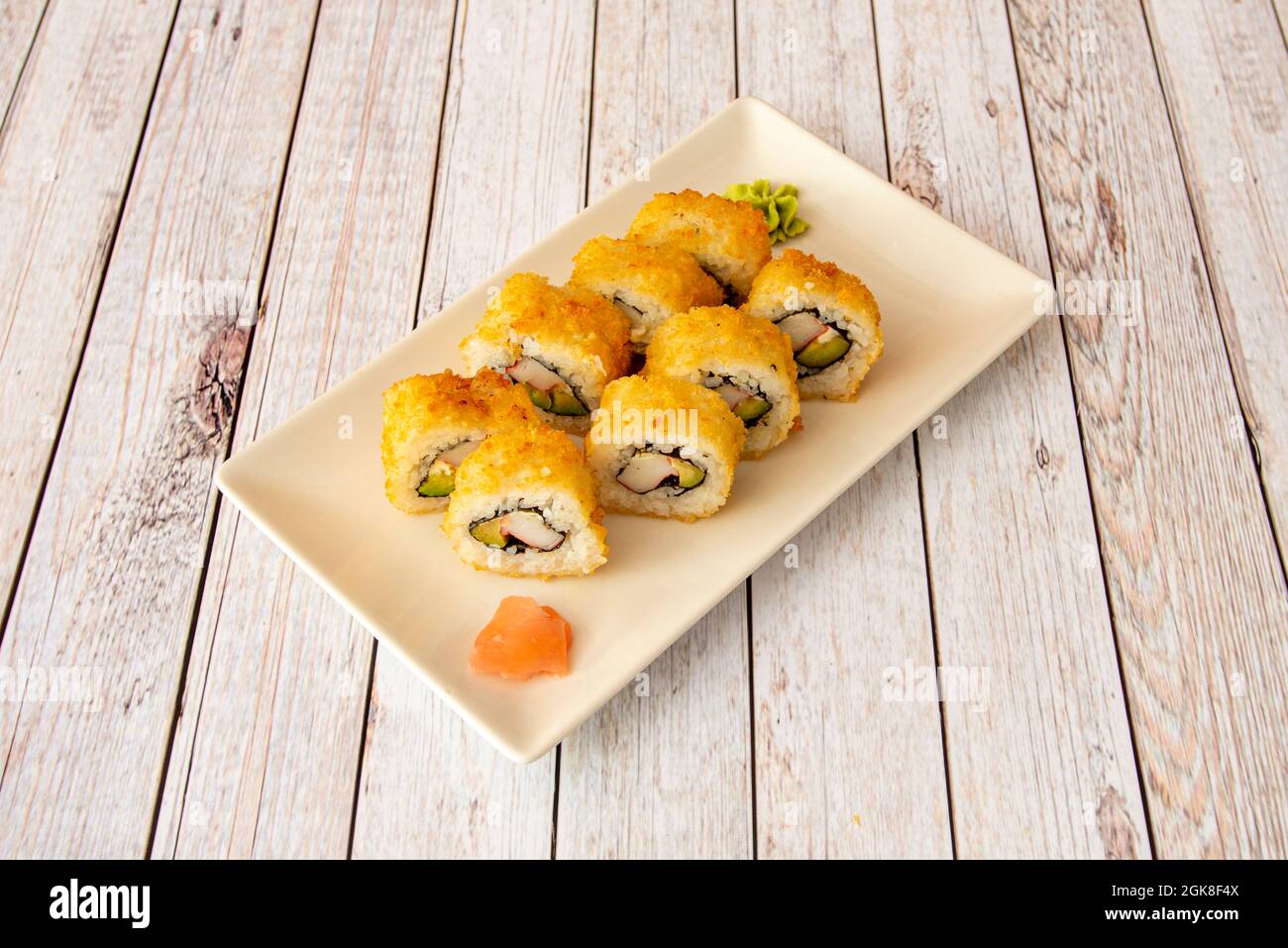 Uramaki california roll fried breaded stuffed with surimi and avocado