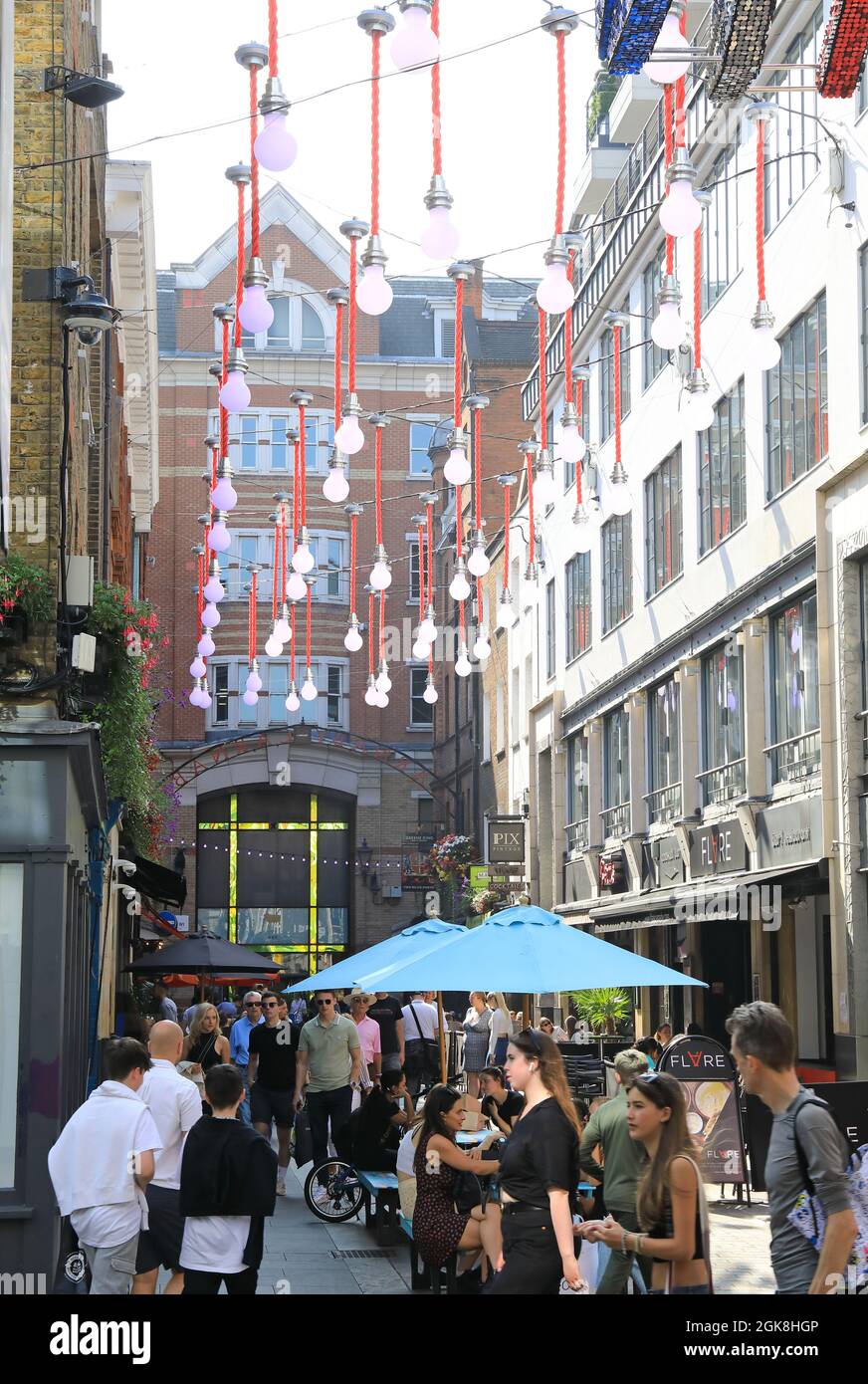 Junction of trendy shopping area Carnaby Street, and the restaurants of