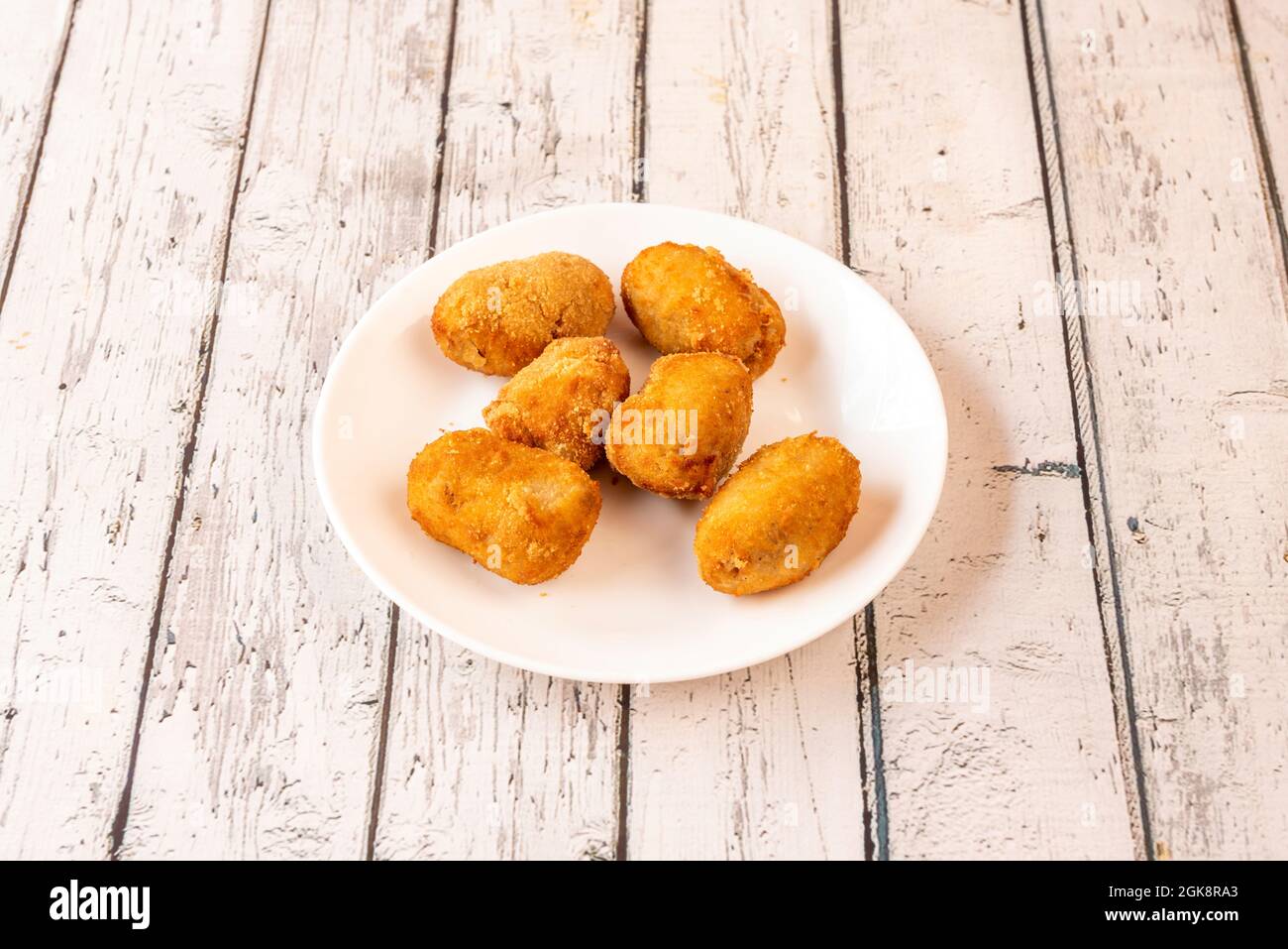 Typical Spanish tapa of croquettes stuffed with béchamel and Iberian